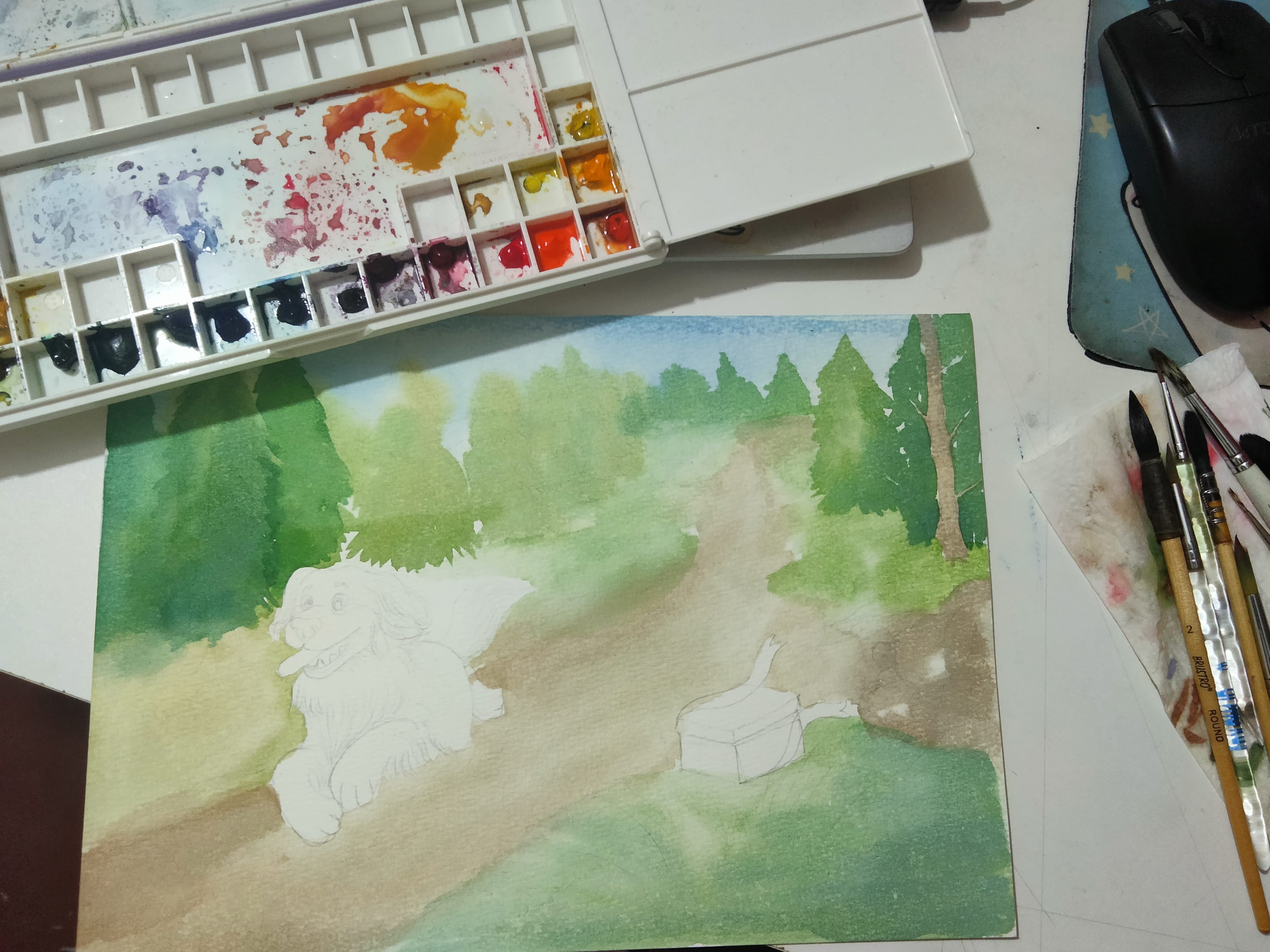 Multiple hand-painted watercolour illustrations for the Spiggle Mouse children's book spread out on the artist's desk
